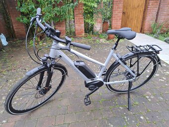 Two Raleigh Motus GT e-Bikes Sizes L and S